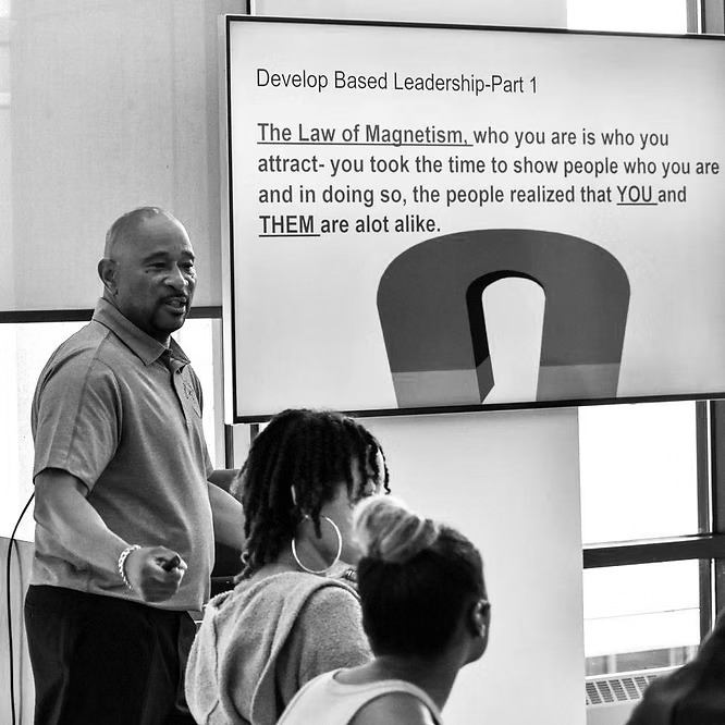 Coach C teaching the Law of Magnetism during a Development Based Leadership session